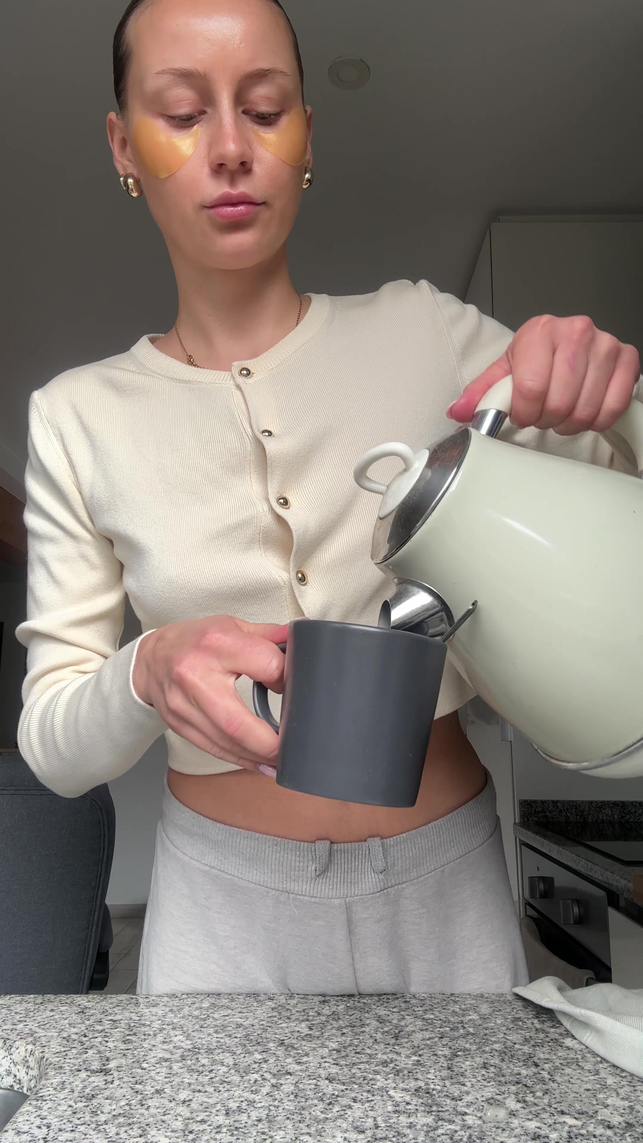 Woman Making Tea During Morning Routine