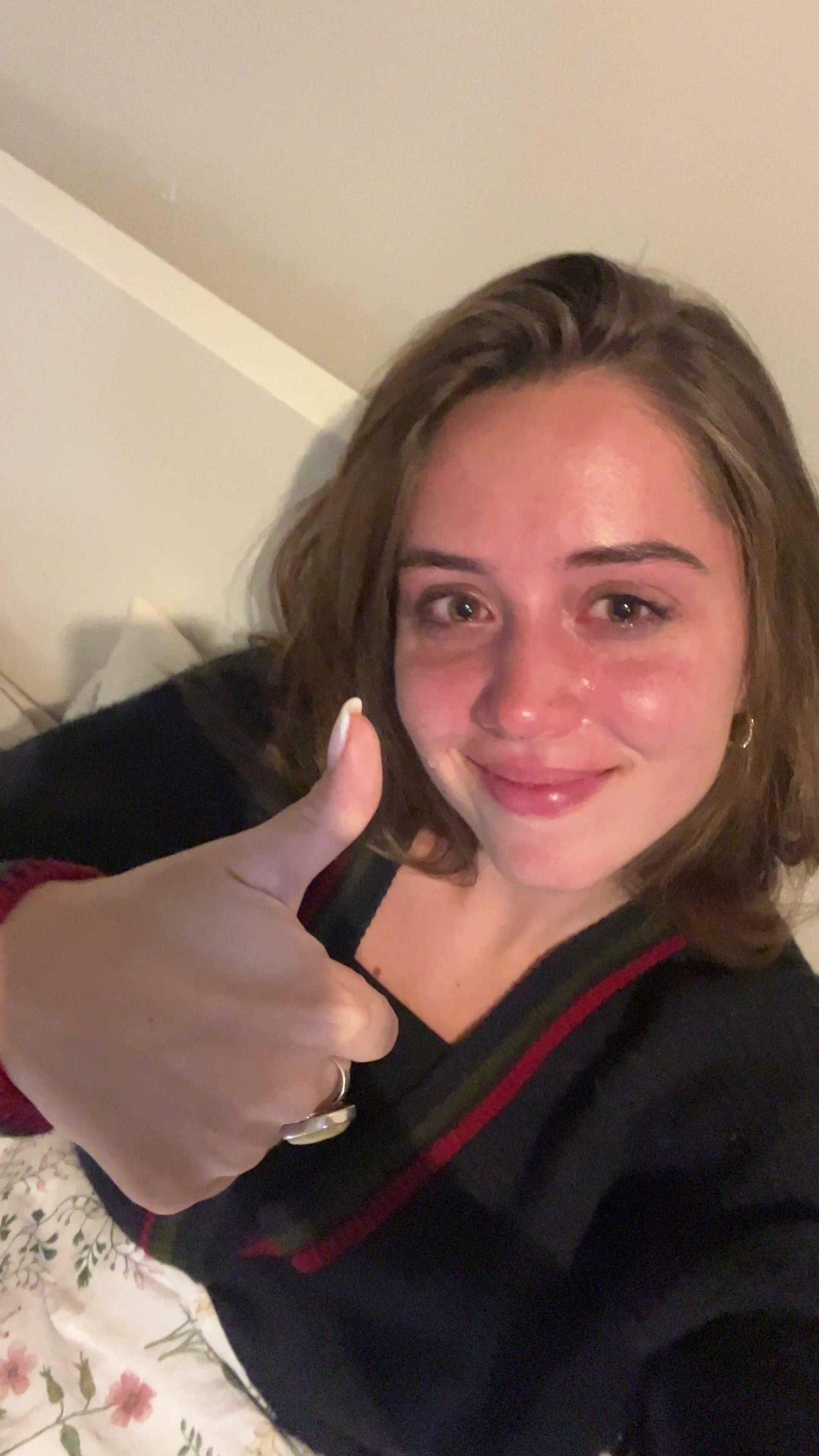Emotional Young Woman Giving Thumbs Up