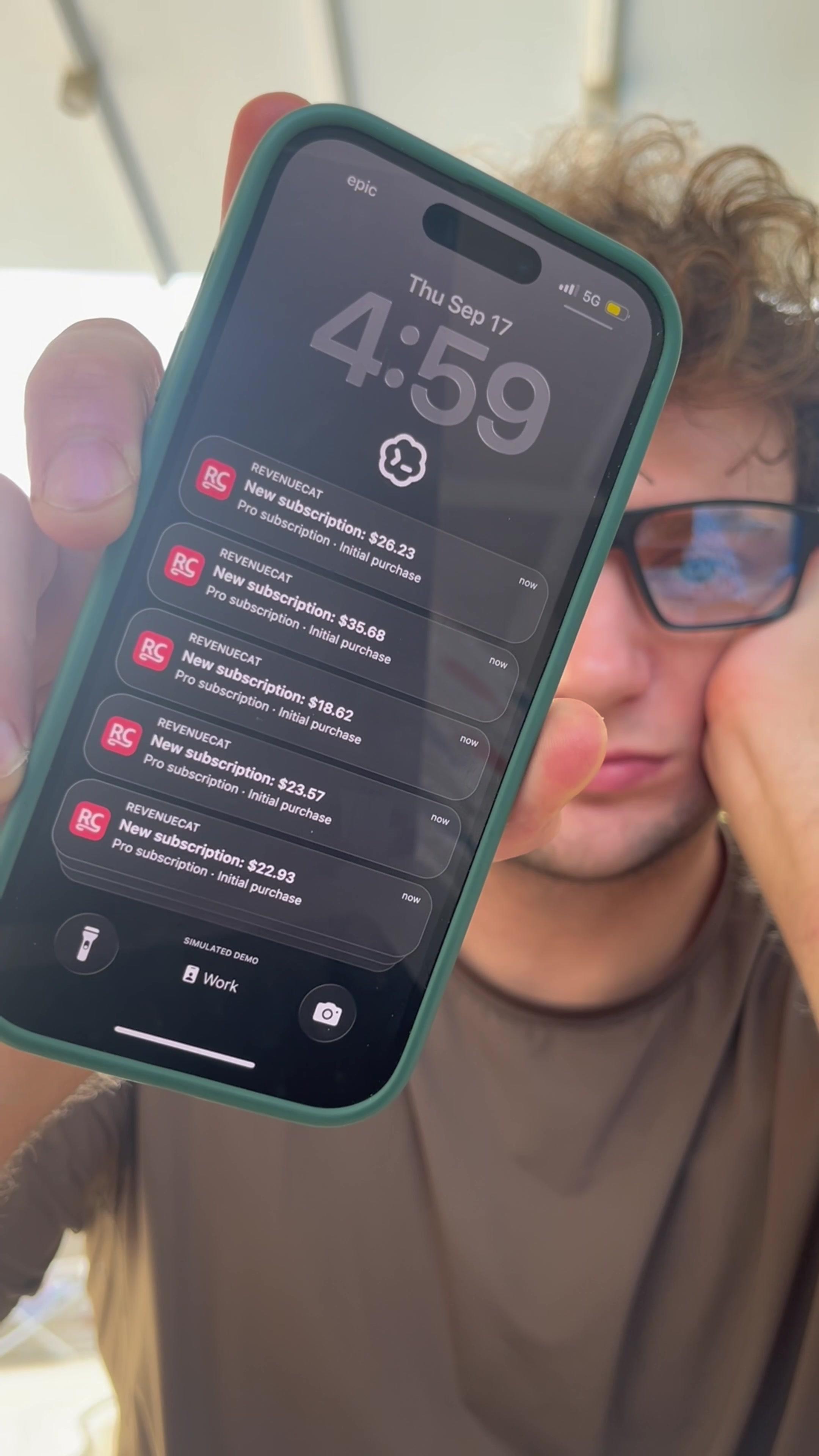 Man Showing Phone With Incoming Notifications